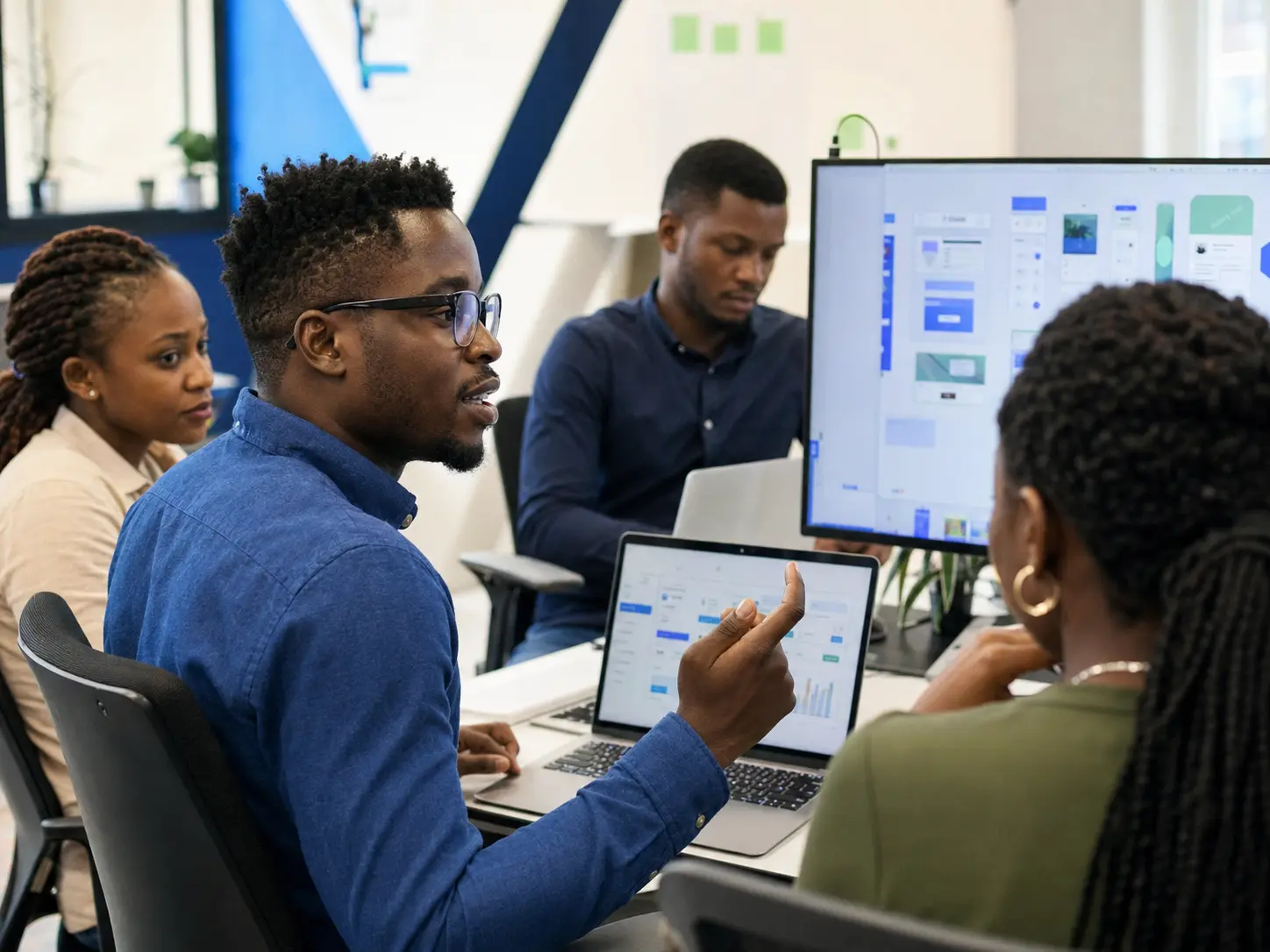 African software team reviewing a digital product together